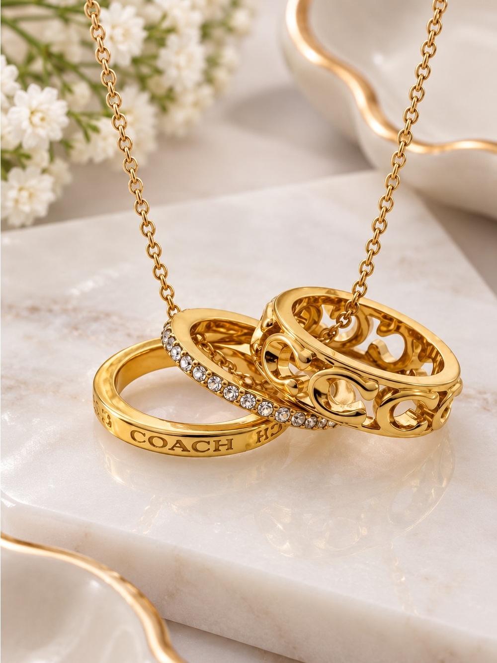 COACH Gold Interlocking Triple Ring Necklace - Picture 3 of 6